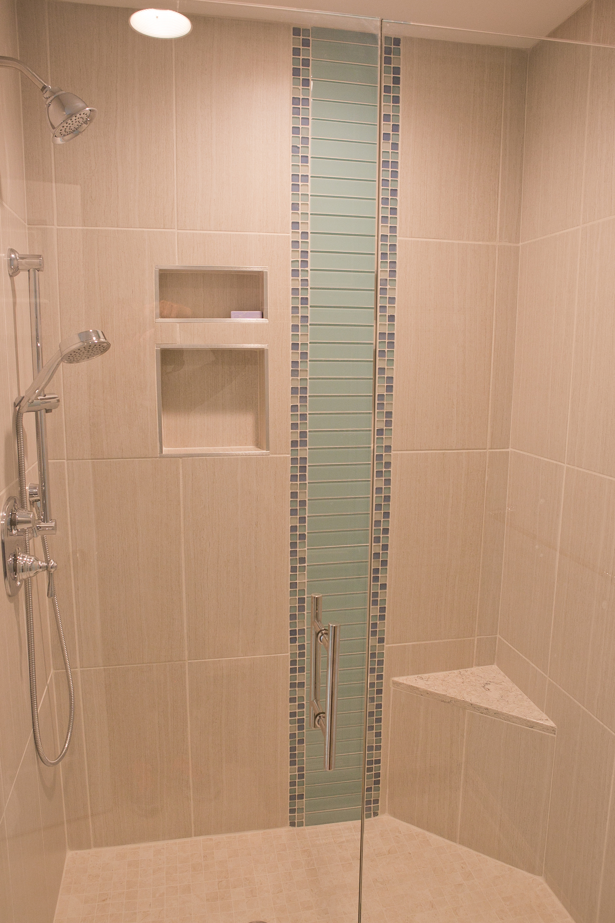 shower with blue and white tiling